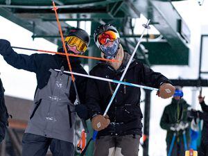 (Francisco Kjolseth | The Salt Lake Tribune) Brothers Preston and Adam Blotter take one last ride on the Albion lift at Alta on Tuesday April 12, 2022. After 60 years in operation, the old two-person lift, along with the Sunnyside lift that serves the same area, will be replaced with a six-person high-speed lift ahead of the next season.