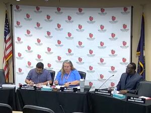 (Screengrab from Salt Lake City School District YouTube channel) Salt Lake City school board Vice President Nate Salazar, left, and President Melissa Ford, center, as the board convened its meeting Tuesday. Superintendent Timothy Gadson III is at right.