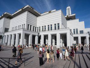 (Rick Egan | The Salt Lake Tribune)  Latter-day Saints walk to the Conference Center for the women's session of General Conference on Saturday, April 2, 2022.