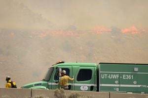(Chris Samuels | The Salt Lake Tribune) Fire crews respond to a wildfire along Interstate 80 west of Magna, Friday, June 17, 2022. Great Salt Lake State Park was temporarily closed due to the nearby fire and related power outages.