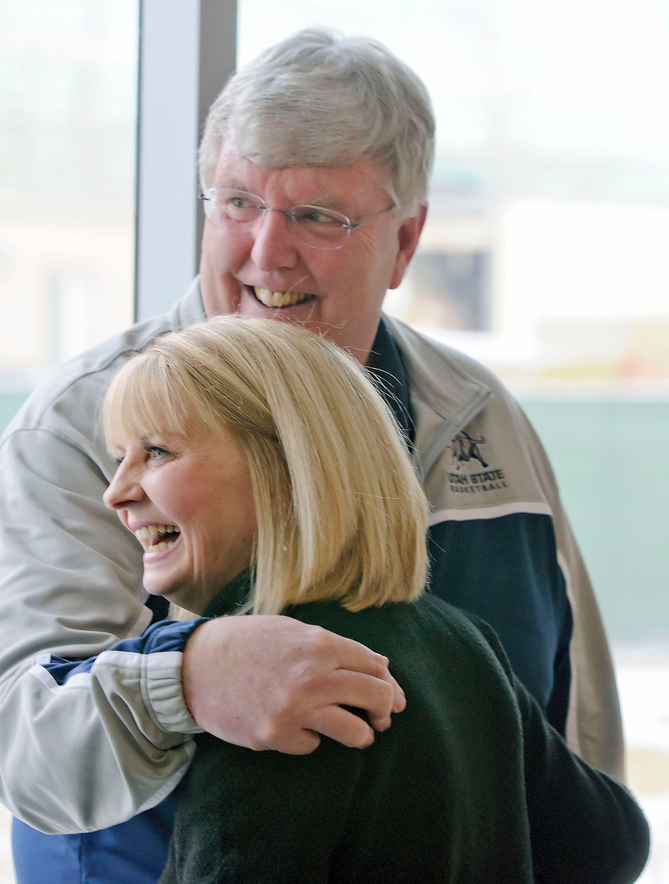 (Eli Lucero | AP Photo vs The Herald Journal) Utah State basketball coach Stew Morrill stands next to his wife Vicki Morrill following a news conference on Jan. 9, 2014, in Logan.