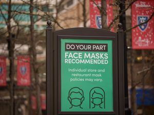 (Trent Nelson | The Salt Lake Tribune) A sign encourages face masks at City Creek shopping center in Salt Lake City on Tuesday, Nov. 30, 2021. Case counts grew by the thousands in the last week, according to data released Thursday, as hospital visits and coronavirus levels founds in sewage also increased.