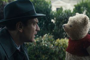 (photo courtesy Walt Disney Pictures) An adult Christopher Robin (Ewan McGregor) is surprised to find his childhood friend, Winnie the Pooh, in London, in a scene from the live-action movie "Christopher Robin."
