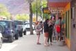(Sophia Fisher | Moab Times-Independent) People gather outside Back of Beyond Books in Moab on April 12, 2024.