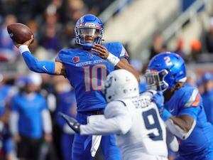(Steve Conner | AP) Boise State quarterback Taylen Green (10) throws the ball against Utah State in the second half of an NCAA college football game, Friday, Nov. 25, 2022, in Boise, Idaho. Boise State won 42-23.