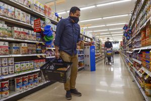 (Leah Hogsten  |  The Salt Lake Tribune) A customer shops for items in a Utah grocery store in 2020. Groceries prices are up 8%, according to the Bureau of Labor Statistics.