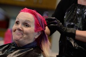 (Francisco Kjolseth  |  The Salt Lake Tribune)  Teachers are using creative ways to get kids' SAGE scores up. Sharon Moore, sixth-grade teacher at North Star Elementary, agreed to dye her hair some wild colors as she continues to teach class on Tuesday, May 8, 2018. This was the incentive that got her kids' scores up nearly 17 percent.