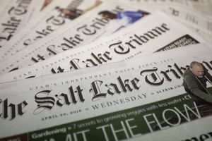 FILE - This April 20, 2016, file photo shows copies of The Salt Lake Tribune newspaper. (AP Photo/Rick Bowmer, File)
