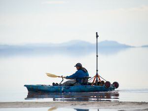 (Rachel Rydalch | The Salt Lake Tribune) Brian Footen kayaks along the shoreline of the Great Salt Lake while digital mapping on Friday, March 25, 2022. He is planning to paddle the entire lake in June. 