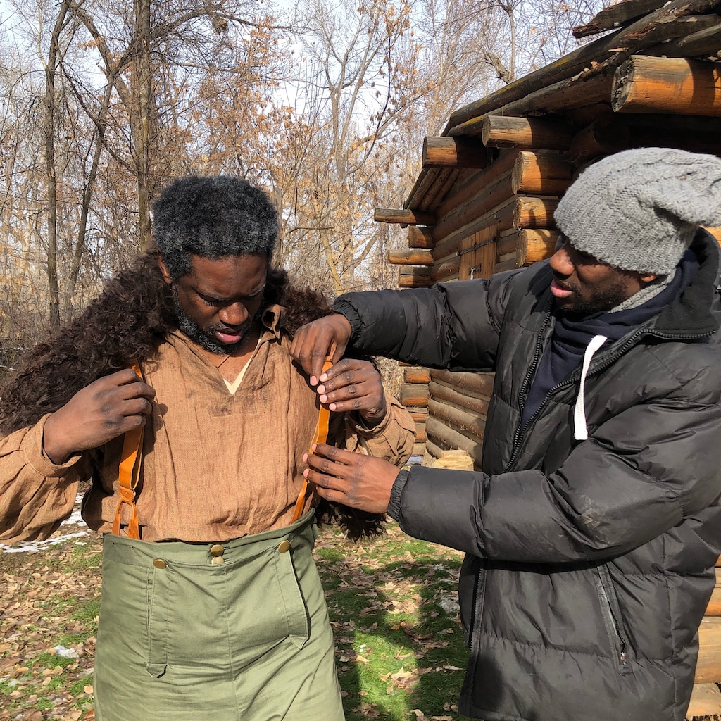 (Photo courtesy of Joseph Reidhead) Writer-director Mauli Junior Bonner, right, helps Yahosh Bonner, playing Green Flake, with his costume on the set in Ogden for the film "His Name Is Green Flake." Mauli Bonner wants monuments placed at Temple Square and This Is the Place Heritage Park to honor Green Flake, an early Black Latter-day Saint.
