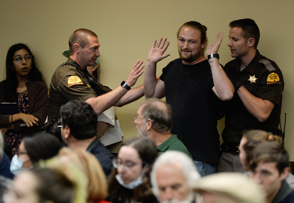 (Francisco Kjolseth | Tribune file photo)  Utah Highway Patrol troopers remove a man disrupting a meeting by the Utah Inland Port Authority at the Utah Capitol on Thursday, Oct. 17, 2019.