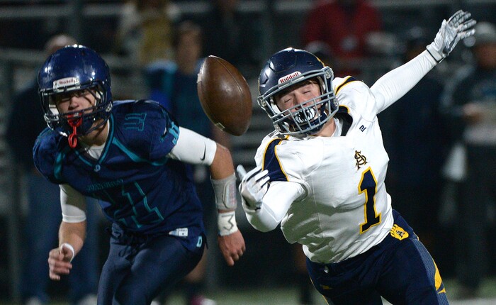 (Leah Hogsten | The Salt Lake Tribune) Summit Academy's Parker Clawson can't pull in the pass. Summit Academy boys' football team leads Juan Diego High School 51-43 during their game, October 13, 2017 in Draper.