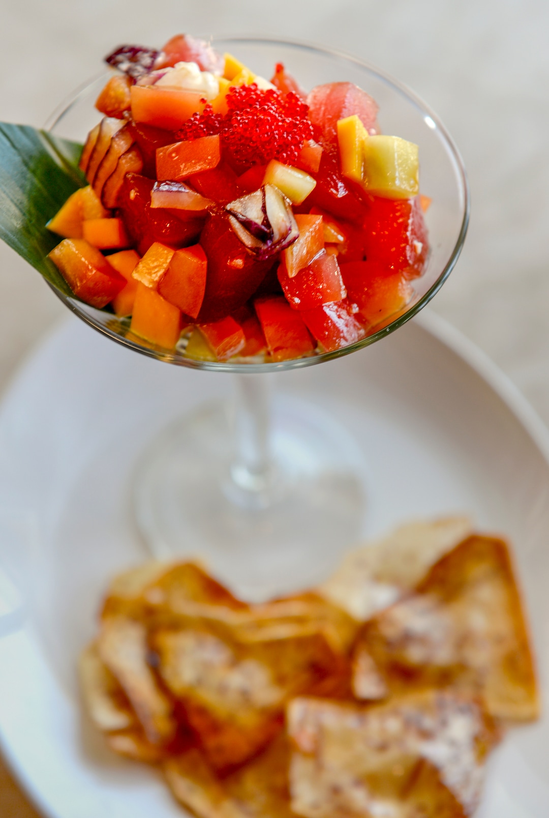 (Leah Hogsten  |  The Salt Lake Tribune)  Saola tuna poke, made with tuna, cucumber, mango, red onion, black garlic ponzu, goma, taro chips and chili strands, $15. Saola restaurant, located in Cottonwood Heights, serves cuisine from Vietnam's three regions, using locally sourced ingredients.