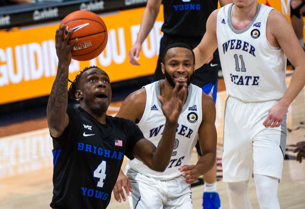 (Rick Egan | The Salt Lake Tribune) Brigham Young Cougars guard Brandon Averette (4) goes in for two points, in basketball action between the Brigham Young Cougars and the Weber State Wildcats at Vivint Arena, on Wednesday, Dec. 23, 2020.