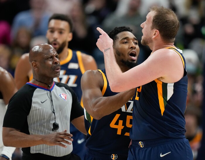 (Francisco Kjolseth | The Salt Lake Tribune) Utah Jazz guard Donovan Mitchell (45) tries to break up an altercation with teammate Utah Jazz guard Joe Ingles (2) and the Timberwolves in NBA action between the Utah Jazz and the Minnesota Timberwolves at Vivint Smart Home Arena in Salt Lake City, Thursday, Dec. 23, 2021.
