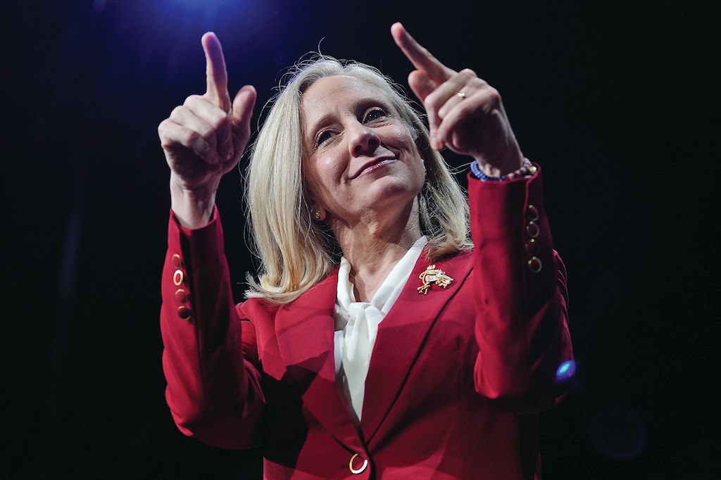 Democrat Abigail Spanberger points out at the crowd after she was declared the winner of the Virginia governor's race during an election night watch party Tuesday, Nov. 4, 2025, in Richmond, Va. (AP Photo/Stephanie Scarbrough)