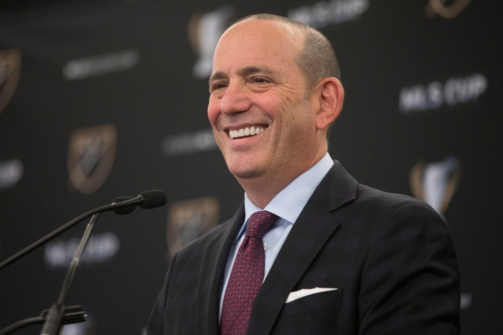 FILE - In this Dec. 9, 2016, file photo, MLS Commissioner Don Garber holds a state of the league news conference in Toronto.  Four cities are in the running to join Major League Soccer. MLS announced Wednesday, Nov. 29, 2017, that Cincinnati; Detroit; Nashville, Tennessee; and Sacramento, California, are finalists for two expansion clubs. Owners and officials representing the expansion markets will make presentations to MLS Commissioner Don Garber and the league's expansion committee on Dec. 6 in New York. (Chris Young/The Canadian Press via AP, File)
