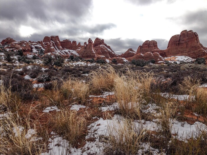 (Erin Alberty  |  The Salt Lake Tribune) 

Sun breaks through the clouds after a snowstorm Nov. 29, 2015 near the Devils Garden campground at Arches National Park.