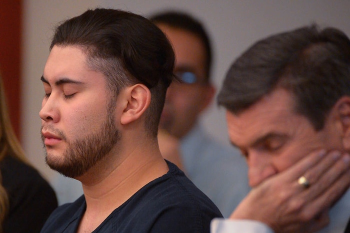 (Trent Nelson | The Salt Lake Tribune)  Abraham Miranda at his sentencing in Salt Lake City, Thursday December 21, 2017. Miranda, 19, pleaded guilty to manslaughter counts for a February crash that killed two of his West High School classmates and critically injured a pregnant woman and her baby. At right is Miranda's attorney Greg Skordas.