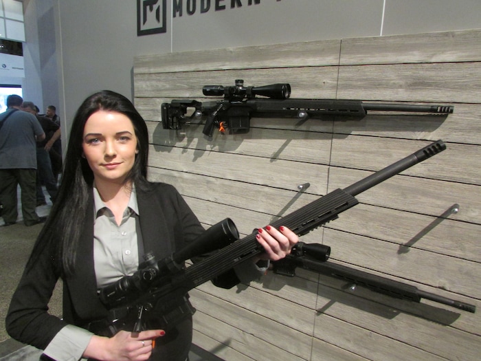 (Tom Wharton | Special to The Tribune) Taylor Whitney of Utah-based Christensen Arms holds the company's new Modern Precision Rifle at the SHOT Show in Las Vegas on Jan. 23, 2018.