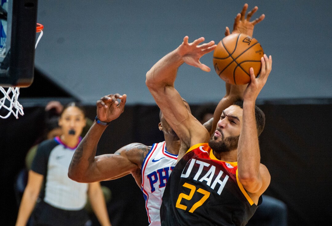 (Rick Egan | The Salt Lake Tribune) Utah Jazz center Rudy Gobert (27) takes the ball to the hoop, in NBA action between the Utah Jazz and the Philadelphia 76ers at Vivint Arena, on Monday, Feb. 15, 2021.