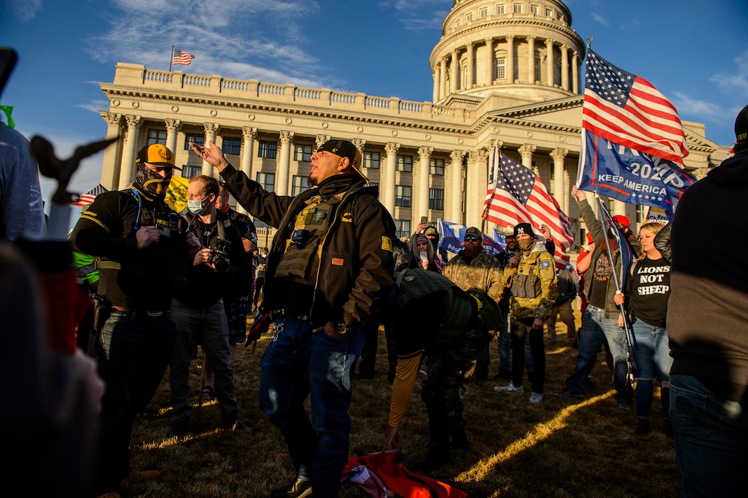 (Trent Nelson  |  The Salt Lake Tribune) Proud Boys look on as a small group with a Black Lives Matter flag are surrounded, as Trump supporters gathered at the State Capitol in Salt Lake City on Wednesday, Jan. 6, 2021.