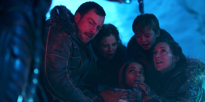 (Courtesy of Netflix) Toby Stephens as John Robinson, Mina Sundwall as Penny Robinson, Taylor Russell as Judy Robinson, Max Jenkins as Will Robinson, and Molly Parker as Maureen Robinson in “Lost in Space.”
