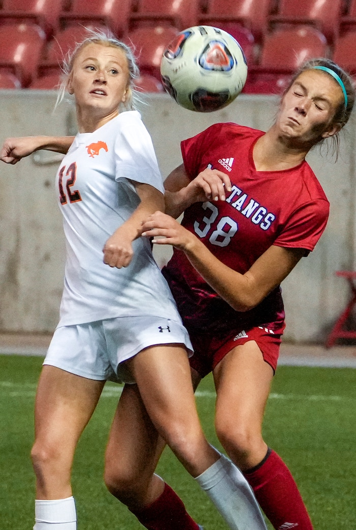 (Leah Hogsten | The Salt Lake Tribune) Mountain Crest's Baylie Baldwin and Crimson Cliffs' Sam Park battle for possession during the 4A State Soccer Championship game between Mountain Crest High School and Crimson Cliffs High School, Oct. 22, 2021 at Rio Tinto Stadium. Mountain Crest defeated Crimson Cliffs 1-0 in double overtime.