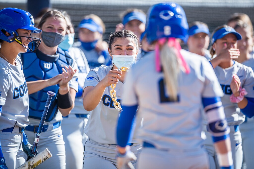 (BYU Photo) Senior Rylee Jensen (2) makes it back home after hitting a home run during the second game of the recent Dixie State series. Jensen led off Thursday's game against Virginia Tech in the NCAA Regional with a home run.