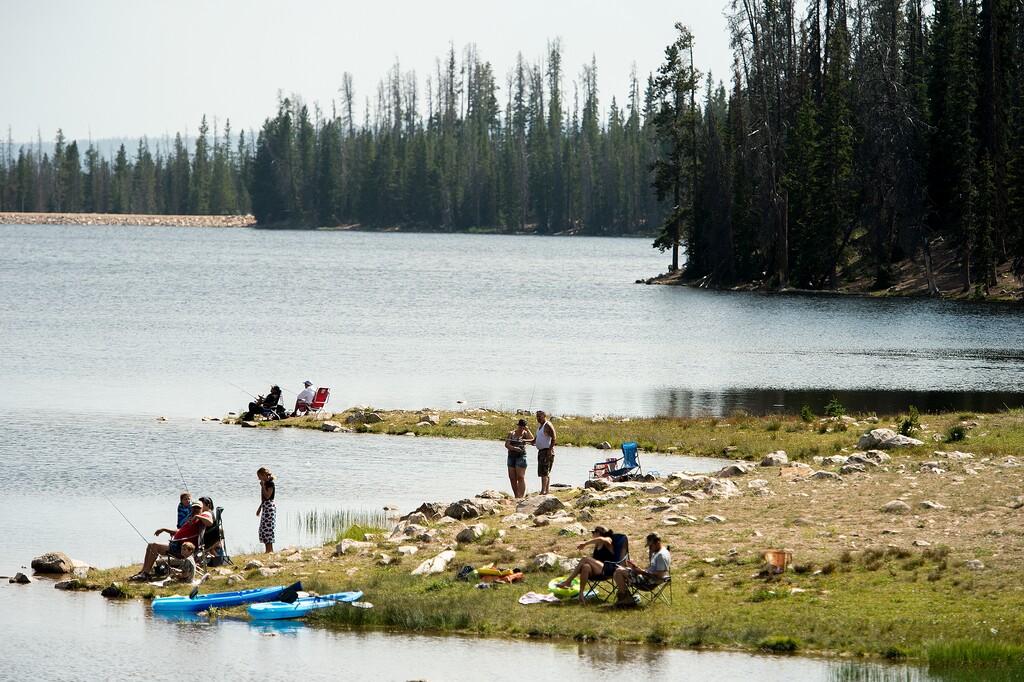 (Leah Hogsten | The Salt Lake Tribune) Kayakers, swimmers and fishing enthusiasts line the banks of Lost Lake, August 6, 2017.