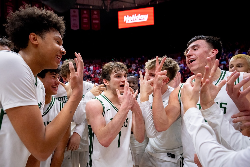 (Trent Nelson  |  The Salt Lake Tribune) Olympus celebrates their win over Bountiful in the 5A state championship game, high school basketball in Salt Lake City on Friday, Feb. 27, 2026.