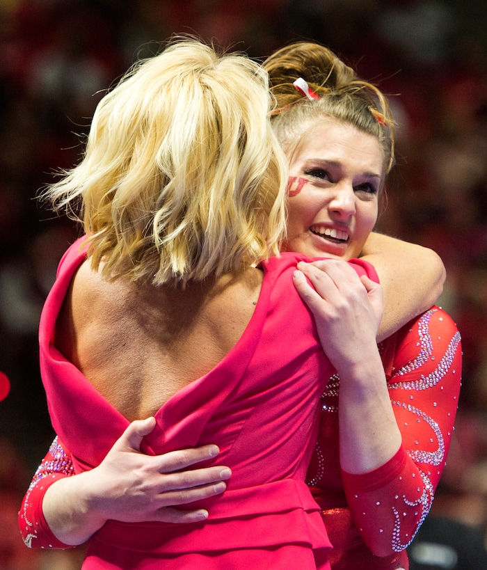 Rick Egan  |  The Salt Lake TribuneBaely Rowe gets a hug from coach Megan Marsden after her performance on the beam for the Utes, in gymnastics action, Utah vs UCLA, at the Huntsman Center, Saturday, February 18, 2017.