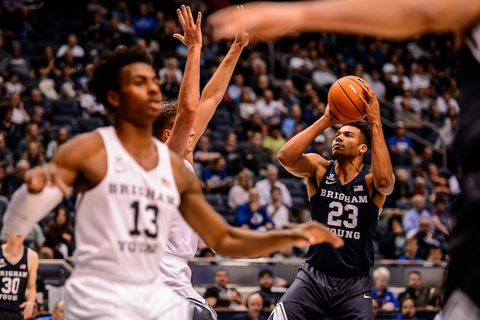 (Trent Nelson | The Salt Lake Tribune)  Brigham Young Cougars forward Yoeli Childs (23) shoots as the BYU men's basketball team plays a scrimmage game known as the Cougar Tipoff, in Provo, Wednesday October 25, 2017.
