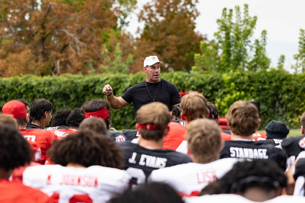 (Utah Athletics) Head coach Morgan Scalley speaks to players during Utah football practice in Salt Lake City, Monday, August. 10, 2026.