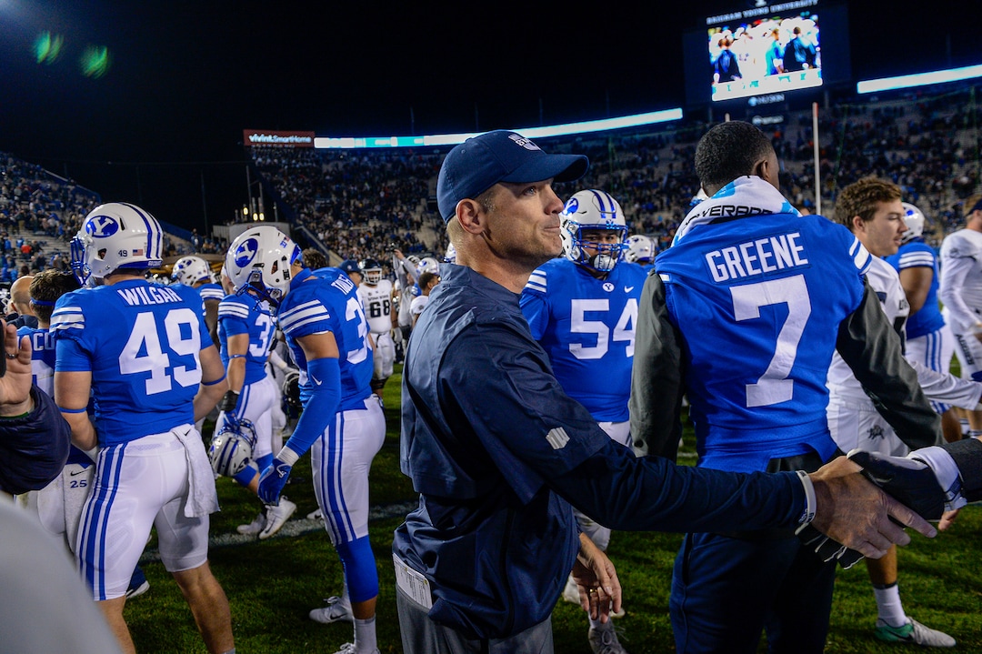 Leah Hogsten  |  The Salt Lake Tribune   Utah State Aggies head coach Matt Wells celebrates with players after the game. Utah State University defeated BYU, 45-20, at Lavell Edwards Stadium in Provo, Friday, Oct. 5, 2018.