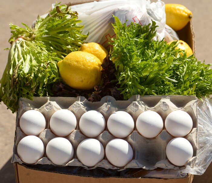 (Leah Hogsten  |  The Salt Lake Tribune)  Snowbird employees handed out over 10,000 pounds of perishable items from the ski resort's restaurants and stores to their workforce, March 21, 2020. The food included milk, eggs, bread, cheeses, every kind of herb, vegetable and fruit, including kumquats and lemon grass, and was given to Snowbird employees on a first-come, first-served basis.