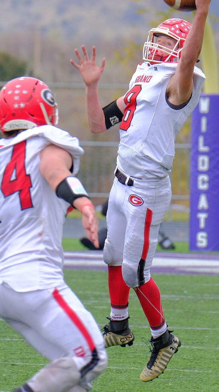 (Leah Hogsten  |  The Salt Lake Tribune)  Grand's Trent Elmore pulls down the catch. South Summit High School boys' football team leads Grand County High School 34-3 during their class 2A state semifinal football game Saturday, November 4, 2017 at Weber State University's Stewart Stadium.