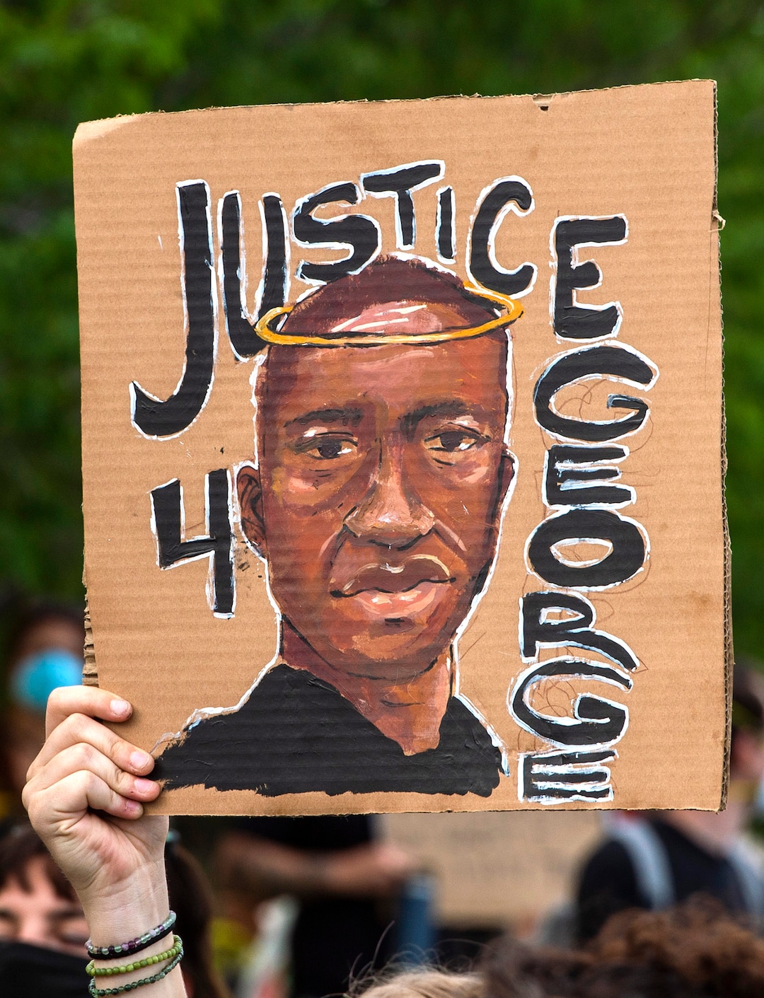 (Rick Egan  |  The Salt Lake Tribune) A sign demands "Justice 4 George" at a protest in front of the State Capitol on June 4, 2020.