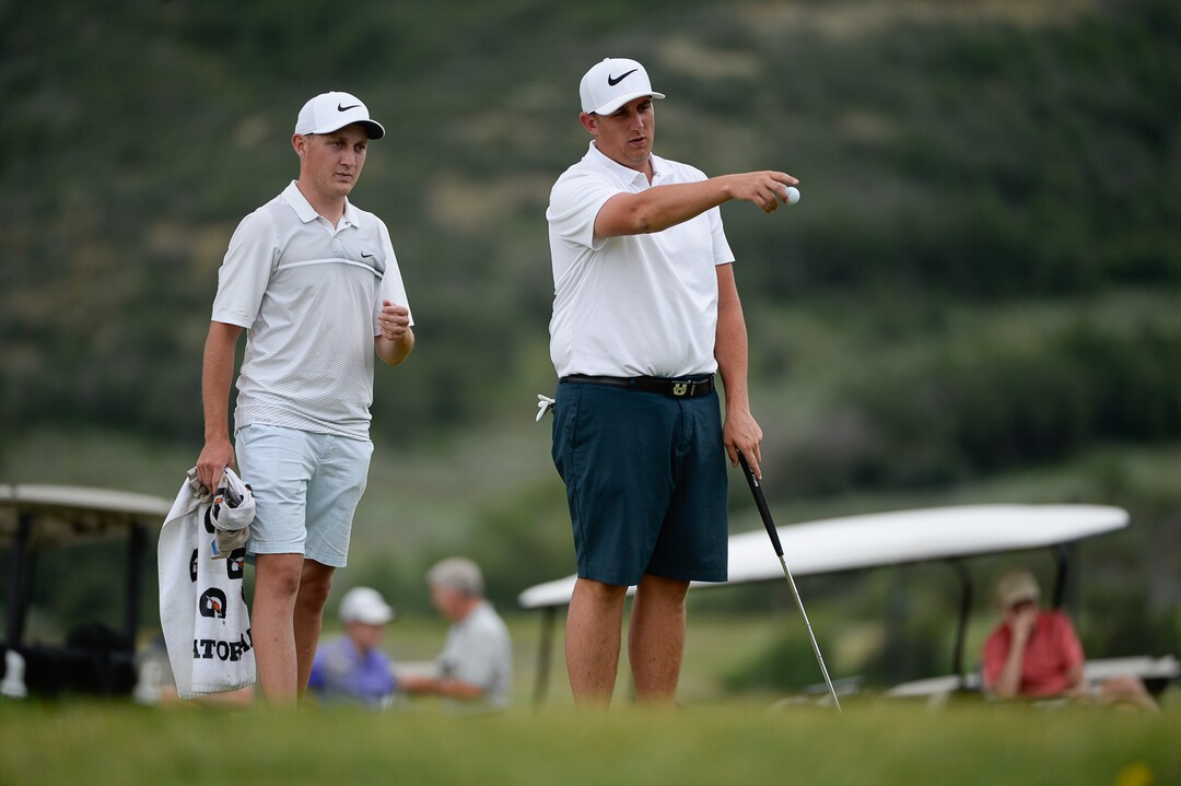 (Francisco Kjolseth  |  The Salt Lake Tribune)  Chase Lansford, right, is joined by caddy Cameron Tucker as he competes in the State Amateur golf championship at Soldier Hollow Golf Course on Saturday, July 13, 2019. Preston Summerhays went on to win 7 and 6 in the final championship match.