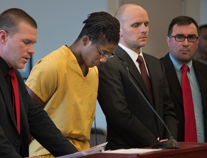 Scott Sommerdorf | The Salt Lake TribuneGerald Grant looks down as his defense team and 3rd District Judge Vernice Trease work their way toward reaching the final sentence for shooting and killing two men and a teenage boy inside an SUV in South Salt Lake nearly two years ago. Sentencing was in front of 3rd District Judge Vernice Trease, Thursday, March 8, 2018.