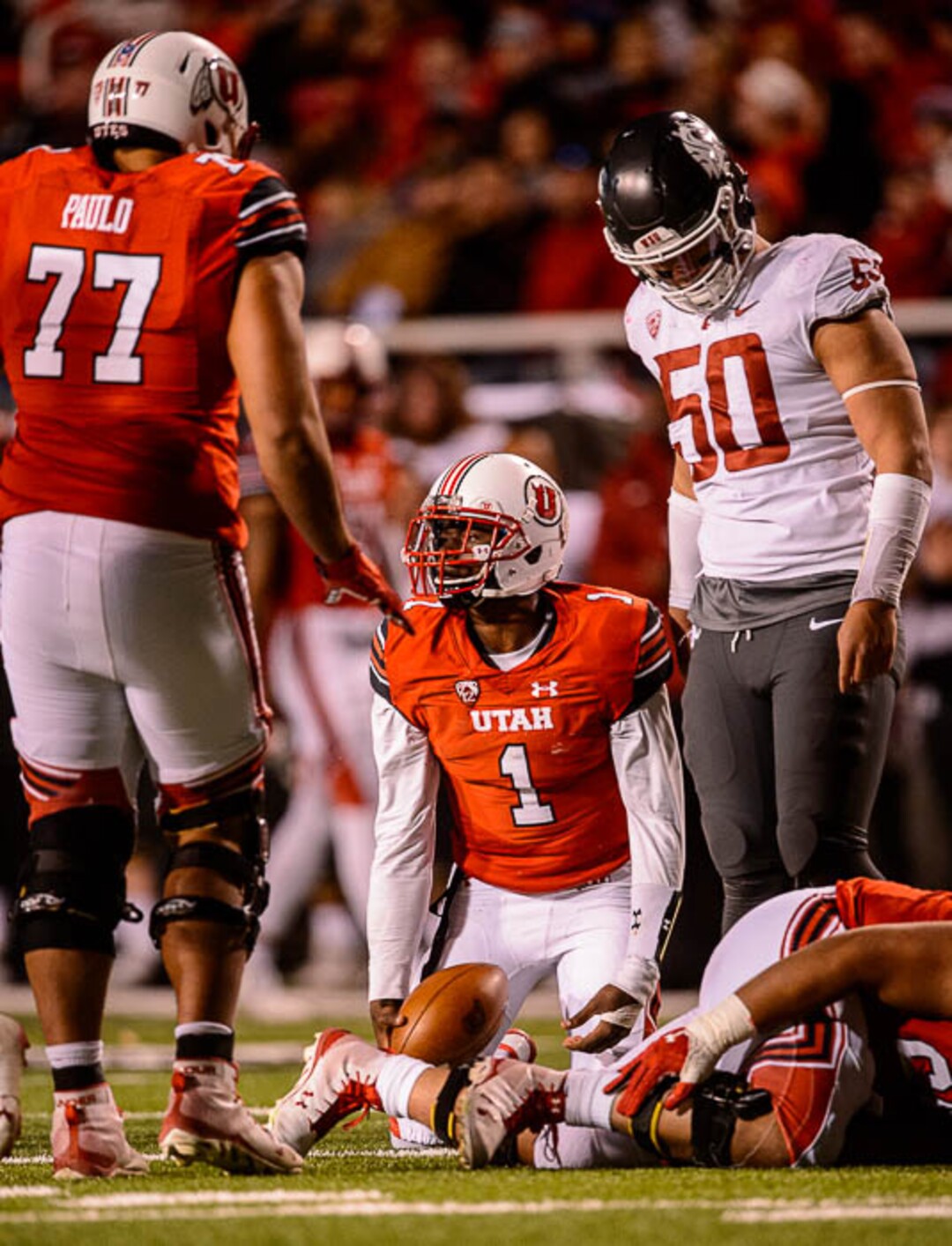 (Trent Nelson | The Salt Lake Tribune)  Utah Utes quarterback Tyler Huntley (1) looks up after another sack as the University of Utah hosts Washington State, NCAA football in Salt Lake City, Saturday November 11, 2017.