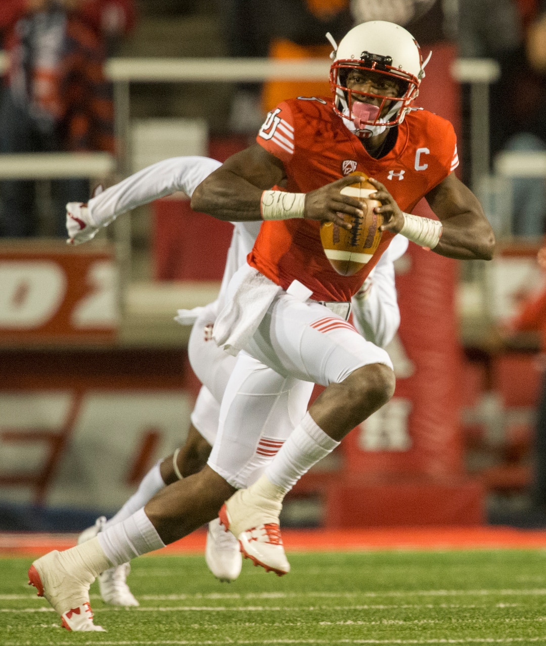 (Rick Egan  |  The Salt Lake Tribune)  Utah Utes quarterback Troy Williams (3) runs for a first down on a quarterback keeper, in PAC-12 football action, at Rice-Eccles Stadium, Saturday, October 7, 2017.
