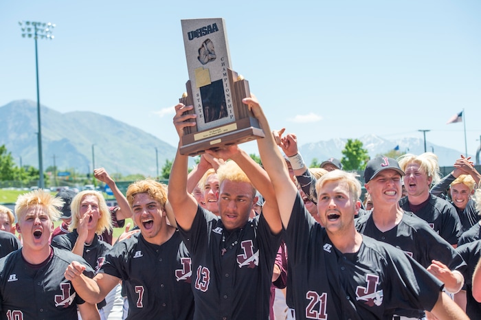 (Rick Egan  |  The Salt Lake Tribune)   Jordan High celebrates their 11-1 win over Olympus, for the 5A state baseball championship, at UVU in Orem, Friday, May 25, 2018.
