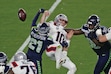 Seattle Seahawks cornerback Devon Witherspoon (21) forces a fumble against New England Patriots quarterback Drake Maye (10) at the NFL Super Bowl 60 game in Santa Clara, Calif., Sunday, February 8, 2026. (Adam Hunger/AP Content Services for the NFL)
