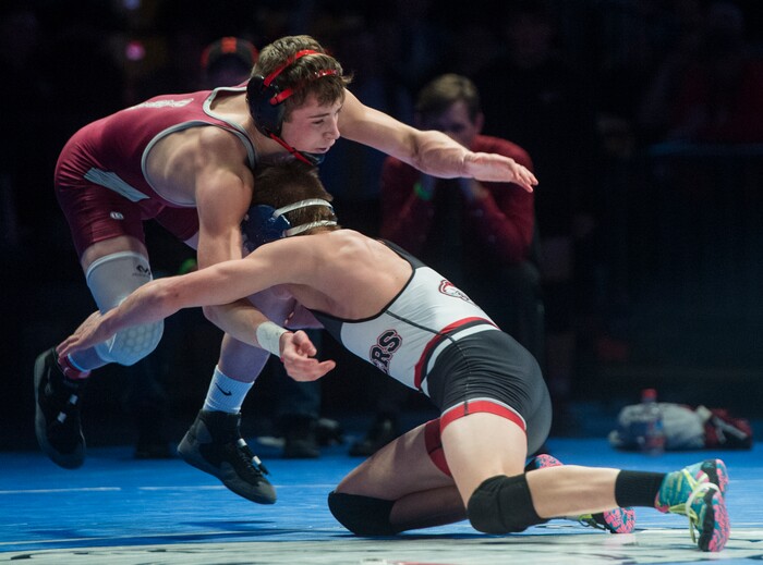 (Rick Egan  |  The Salt Lake Tribune)   Randon Deets (Uintah) wrestles Joshua Armstrong (Hurricane) in the 126 weight class, in the 4A Utah State Wrestling Championships, at UVU in Orem, Saturday, February 10, 2018.