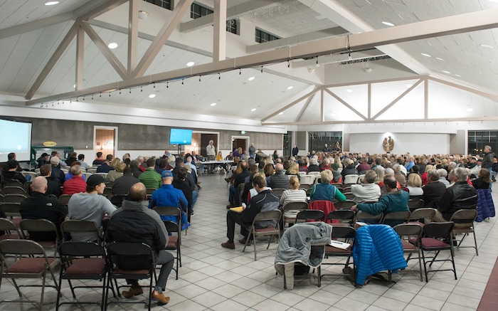 (Rick Egan  |  The Salt Lake Tribune)  Hundreds of concerned citizens gather at the St Vincent De Paul Catholic School for a public hearing about the developers plans for the old Cottonwood Mall site. Wednesday, December 13, 2017.


