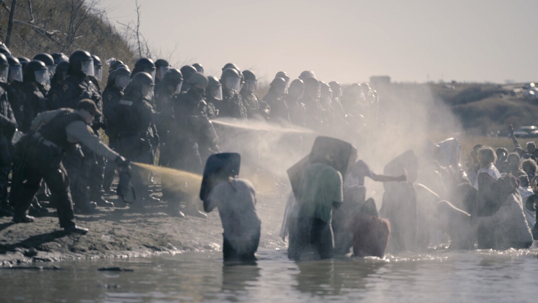 (Cody Lucich  |  courtesy Sundance Institute) Activists face a barrage from militarized police at the site of the proposed Dakota Access Pipeline, in a scene from Cody Lucich's "Akicita: The Battle of Standing Rock," which will screen in the Documentary Premieres program of the 2018 Sundance Film Festival.