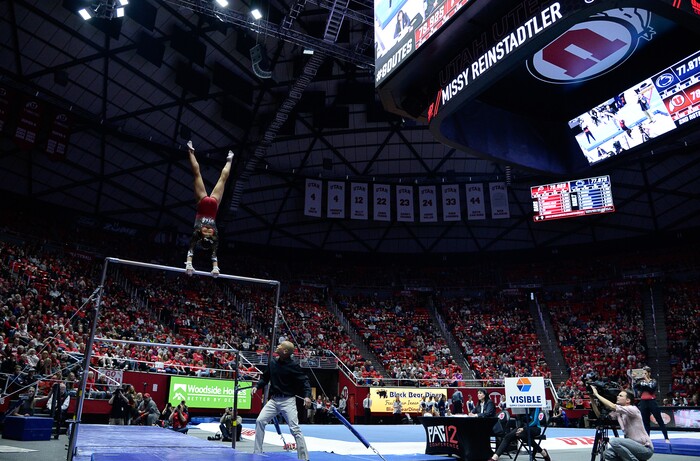 (Francisco Kjolseth  |  The Salt Lake Tribune)  Missy Reinstadtler competes on the bars as Utah hosts Penn State in their season opener at the Huntsman Center in Salt Lake City on Saturday, Jan. 5, 2019.