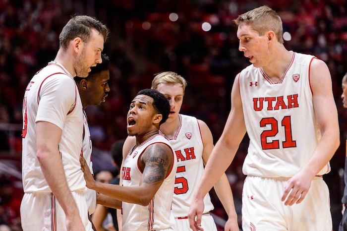 (Trent Nelson | The Salt Lake Tribune)  Utah Utes guard Justin Bibbins (1) in a huddle with teammates at USC takes a double-digit lead as the University of Utah hosts USC, NCAA basketball at the Huntsman Center in Salt Lake City, Saturday Feb. 24, 2018.