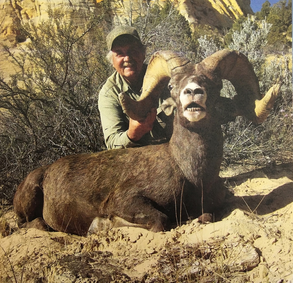 (Photo courtesy of Utah Division of Wildlife Resources) Hunting guide Larry Altimus, an Arizona resident, poses with the desert bighorn ram he killed illegally in southwestern Utah in 2014. In addition to a felony conviction and more than $30,000 in restitution and fines, Altimus has lost his hunting privileges in 47 states.